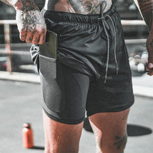 Laden Sie das Bild in den Galerie-Viewer, 2-in-1-Fitness-Turnhose mit sicherer Tasche ( Shorts & Verkürzte Hose)