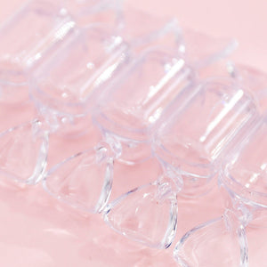Transparente Schmuckschatulle in Bonbonform